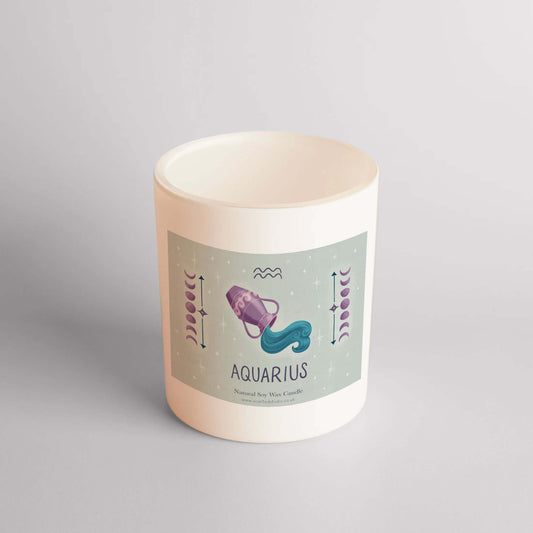 Aquarius star sign candle in matte white vessel with French vanilla scent.